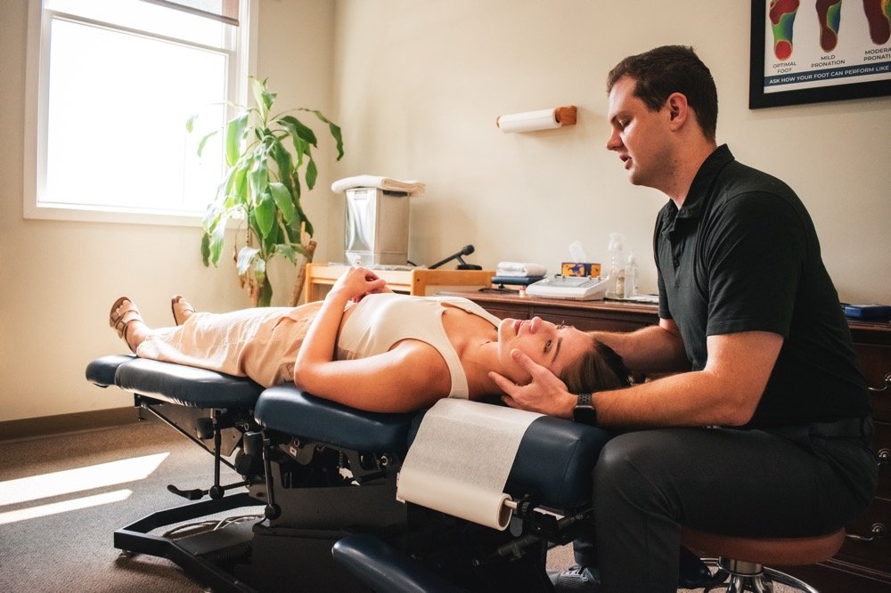 Dr. Brien Polivka, DC, treating a patient